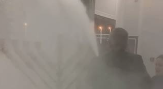 Polish MP Puts Out Menorah in Parliament with a Fire Extinguisher